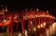 Vietnam: The red painted The Huc Bridge (Rising Sun or Sunbeam Bridge) leading to Den Ngoc Son or Jade Mountain Temple, Hoan Kiem Lake, Hanoi